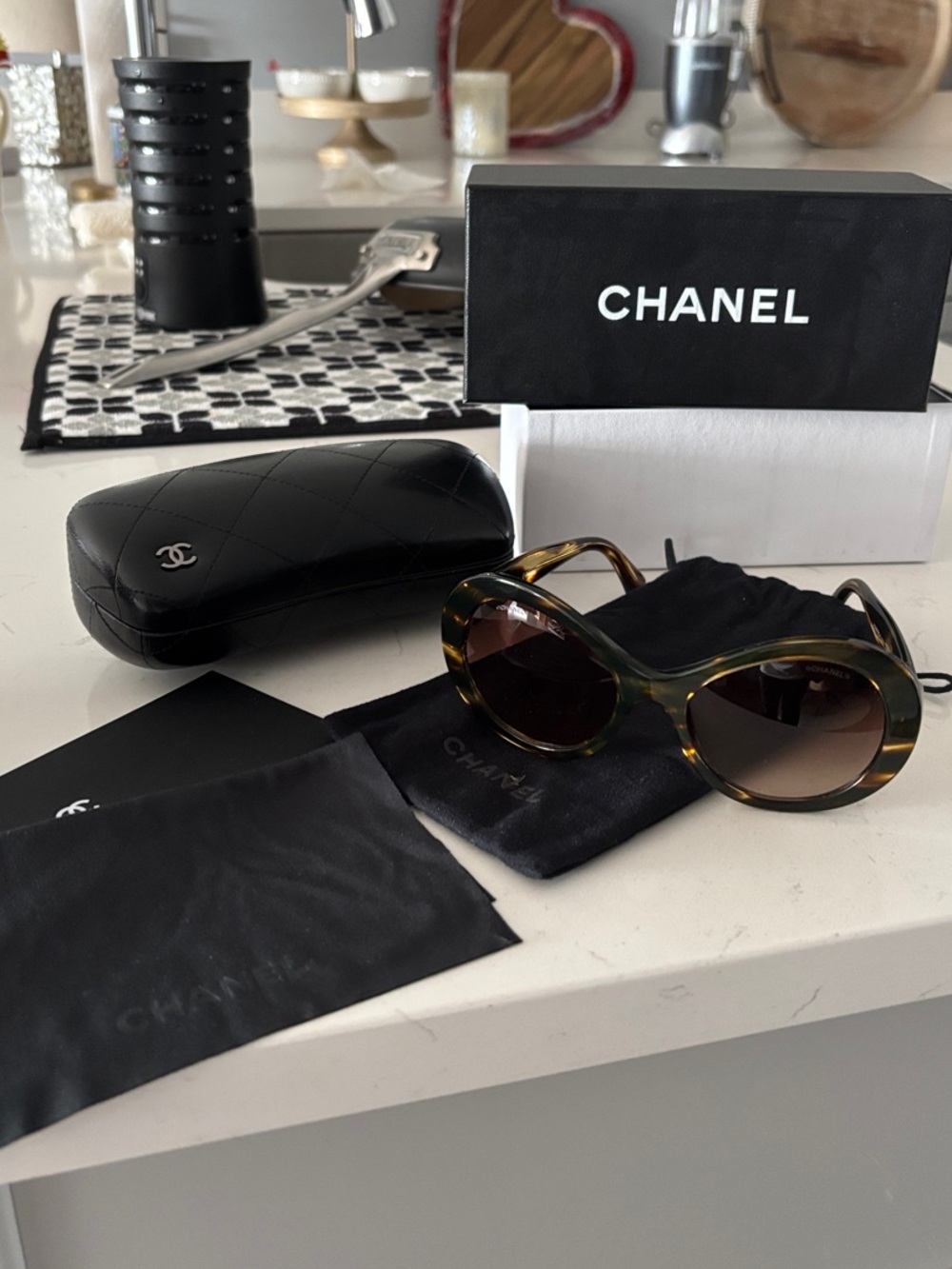 CHANEL Tortoiseshell Oval Sunglasses with Brown Gradient Lenses